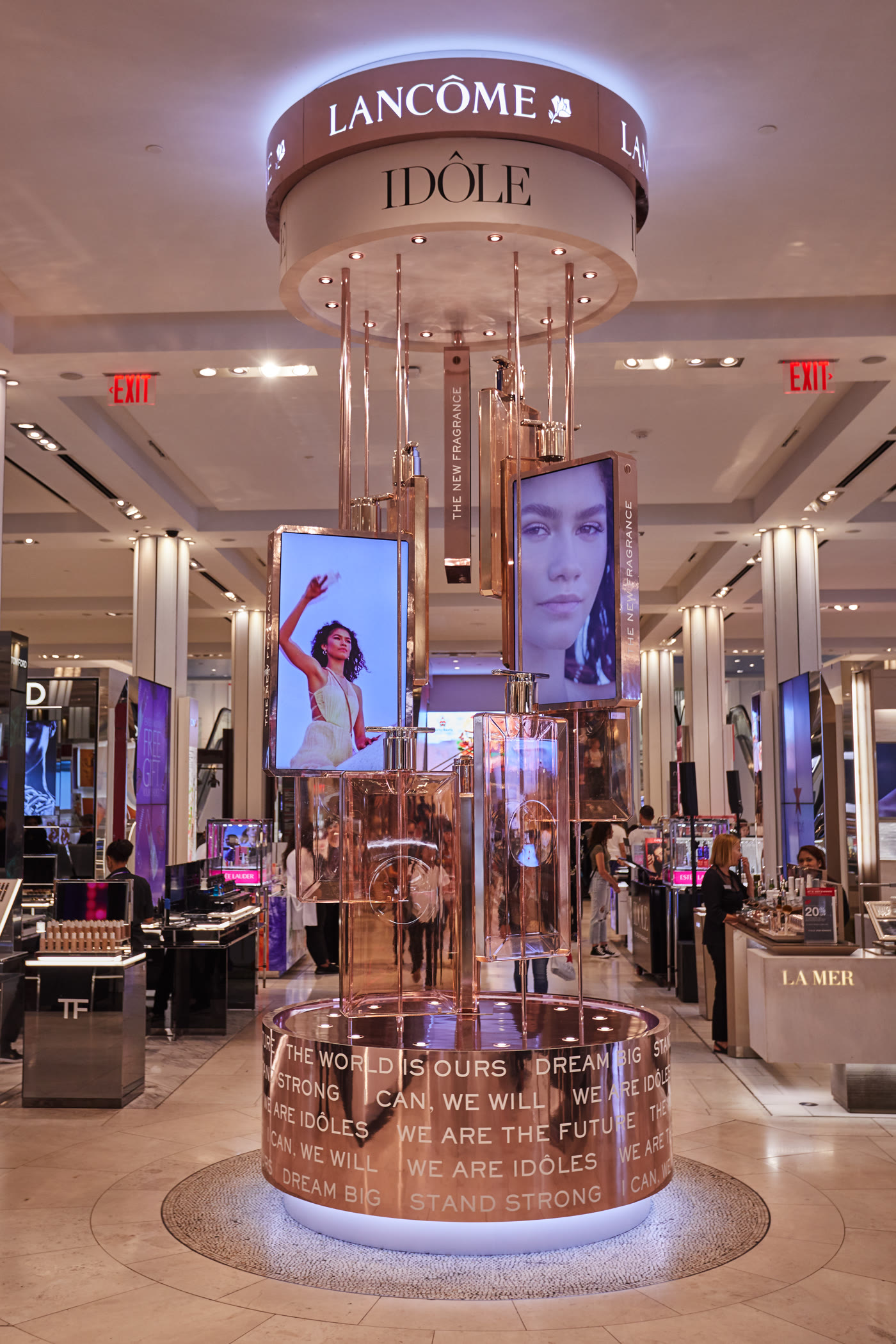 Lancôme Idôle tiered display tower with digital screens