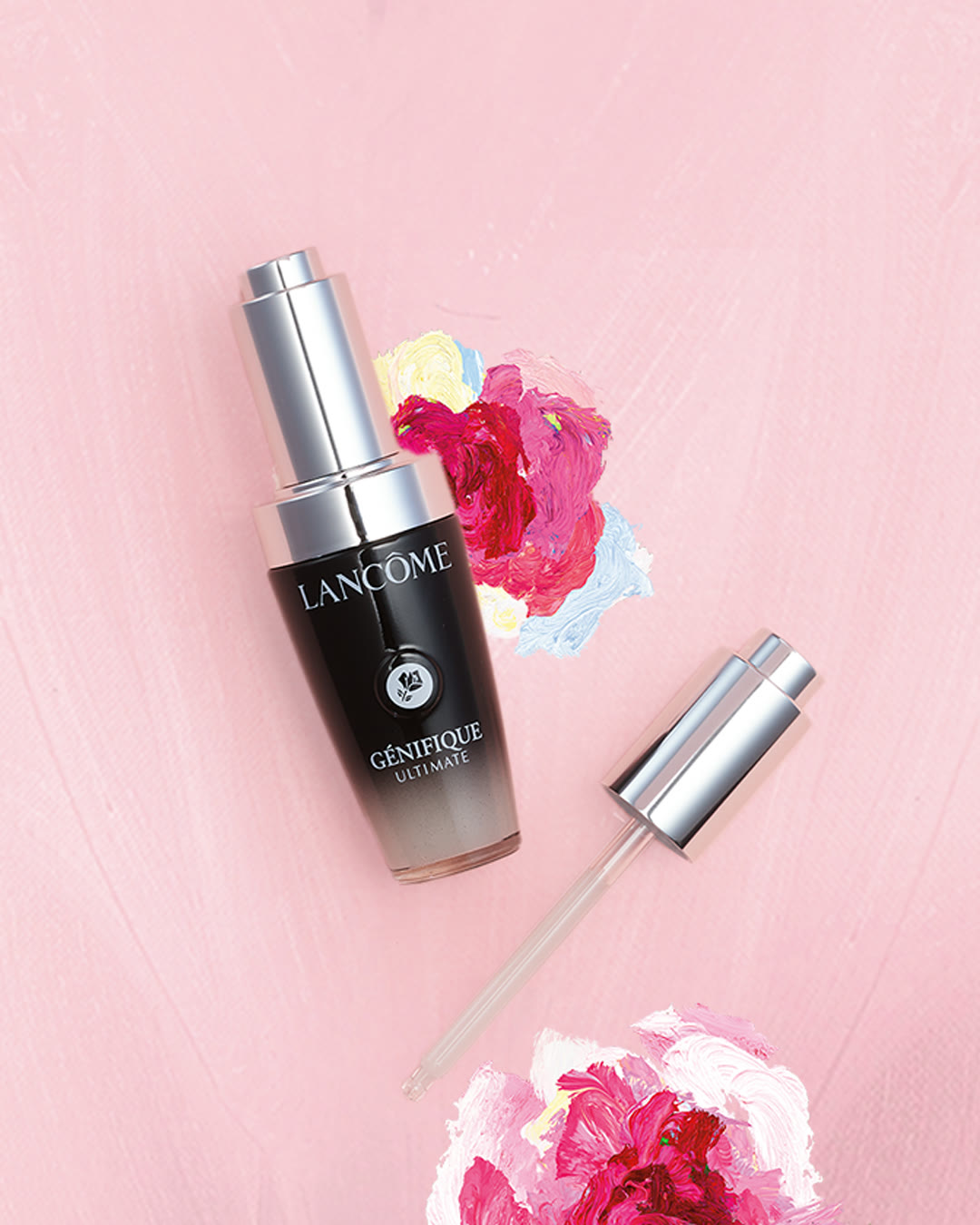 Lancôme Génifique serum bottle with floral artwork
